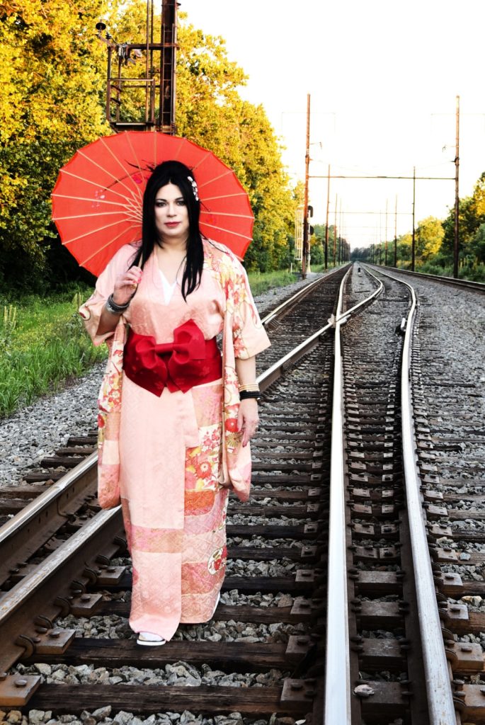 A Day as a Geisha | She paints her face to hide her face | Nora A. Simone | TransLiving International